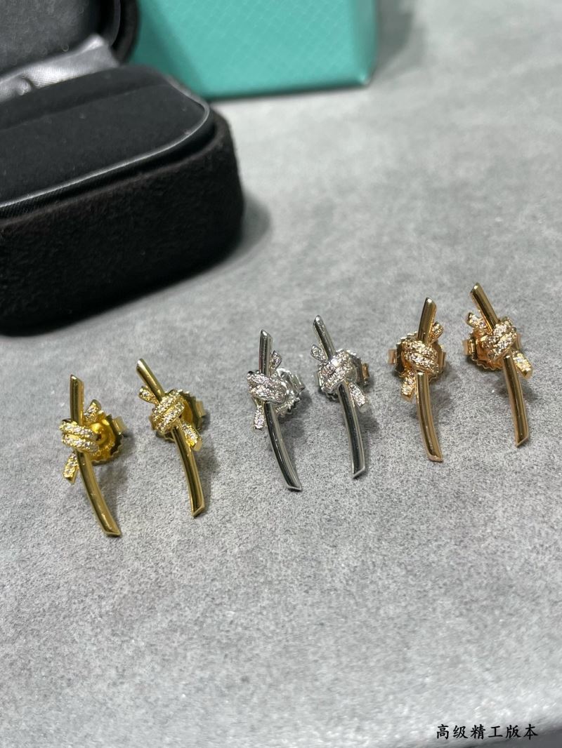 T*f*ny earrings